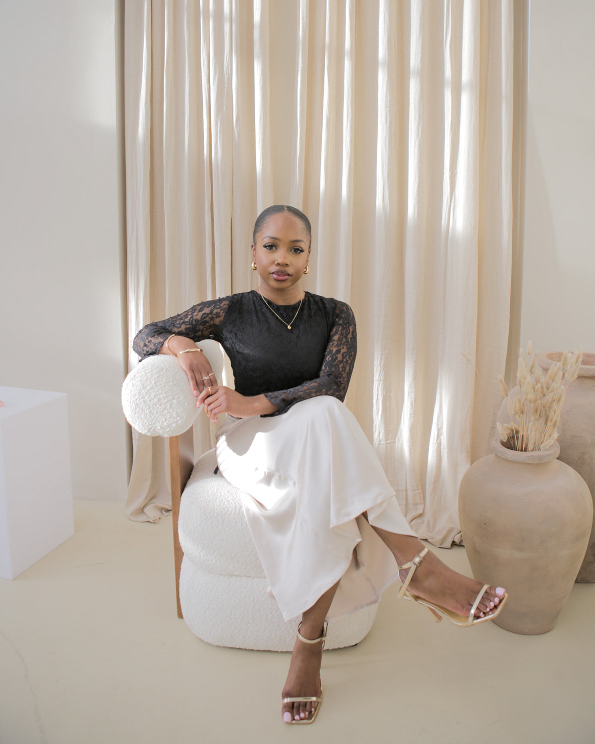 Black with cream seated view - Khalida petite lace and satin dress