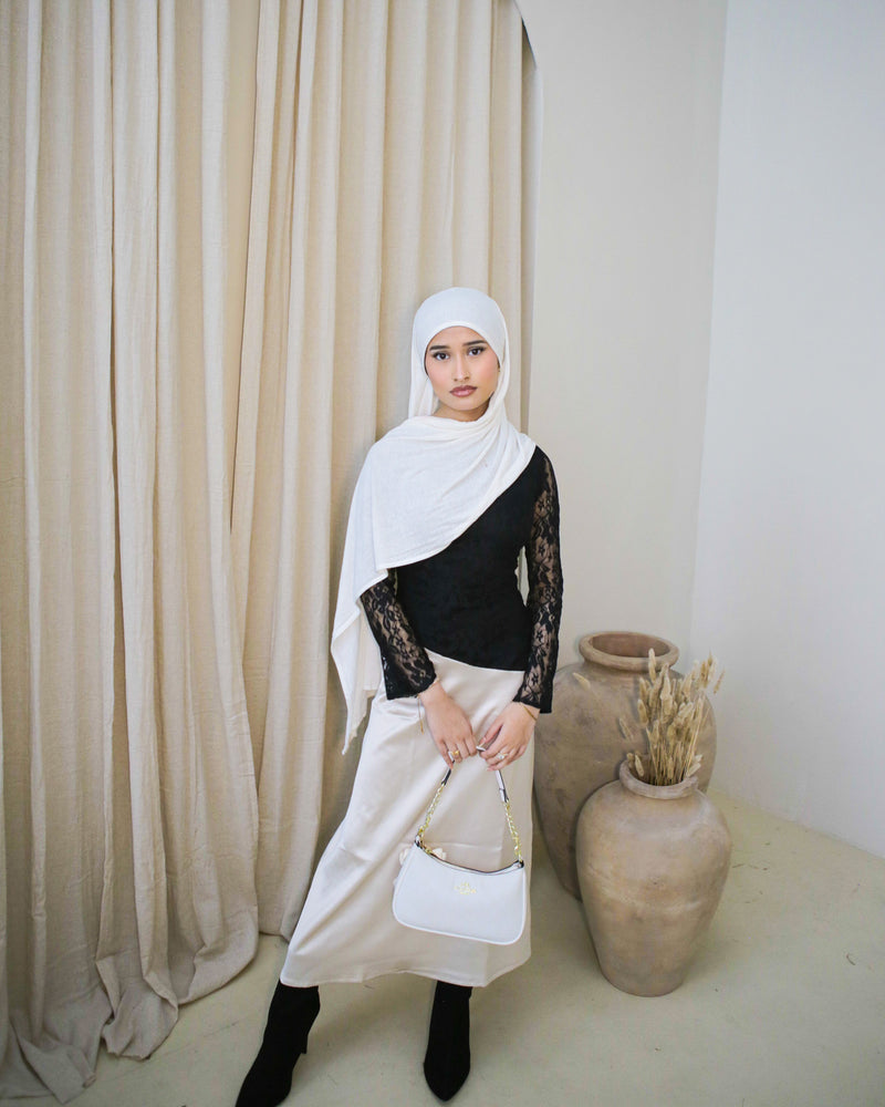 Black with cream standing front view - Khalida petite lace and satin dress