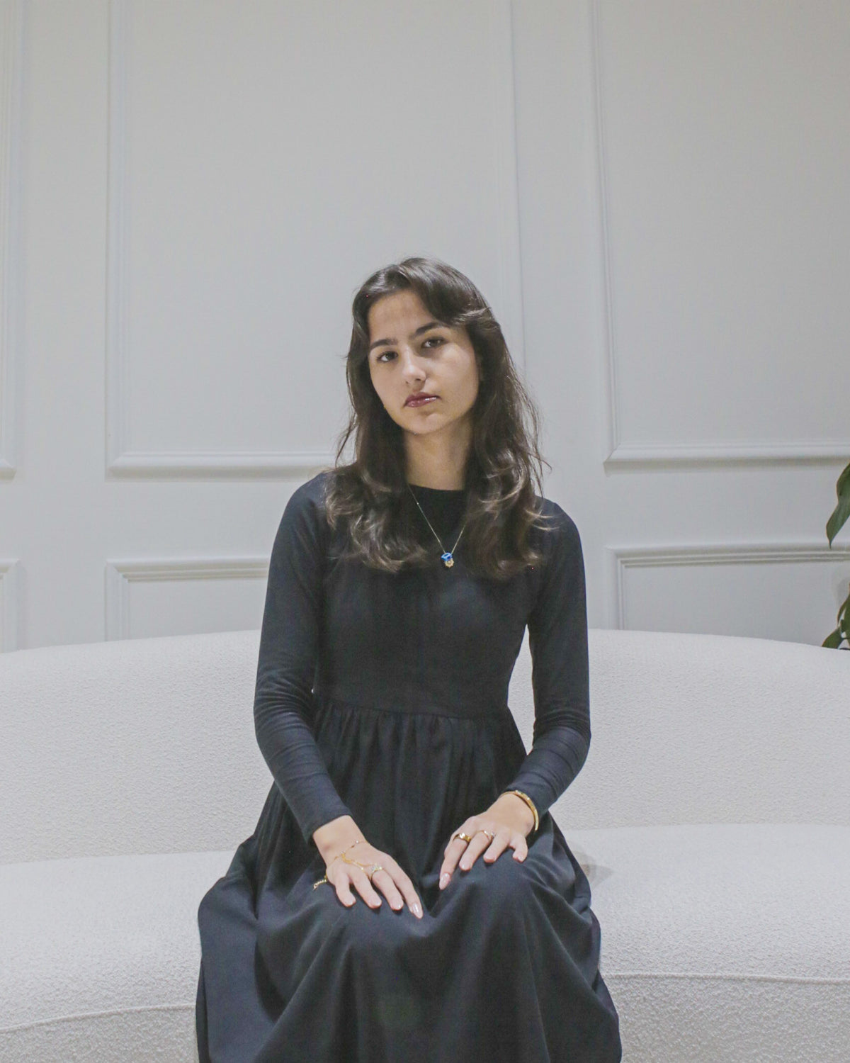 Black seated view - Amina petite jersey maxi dress