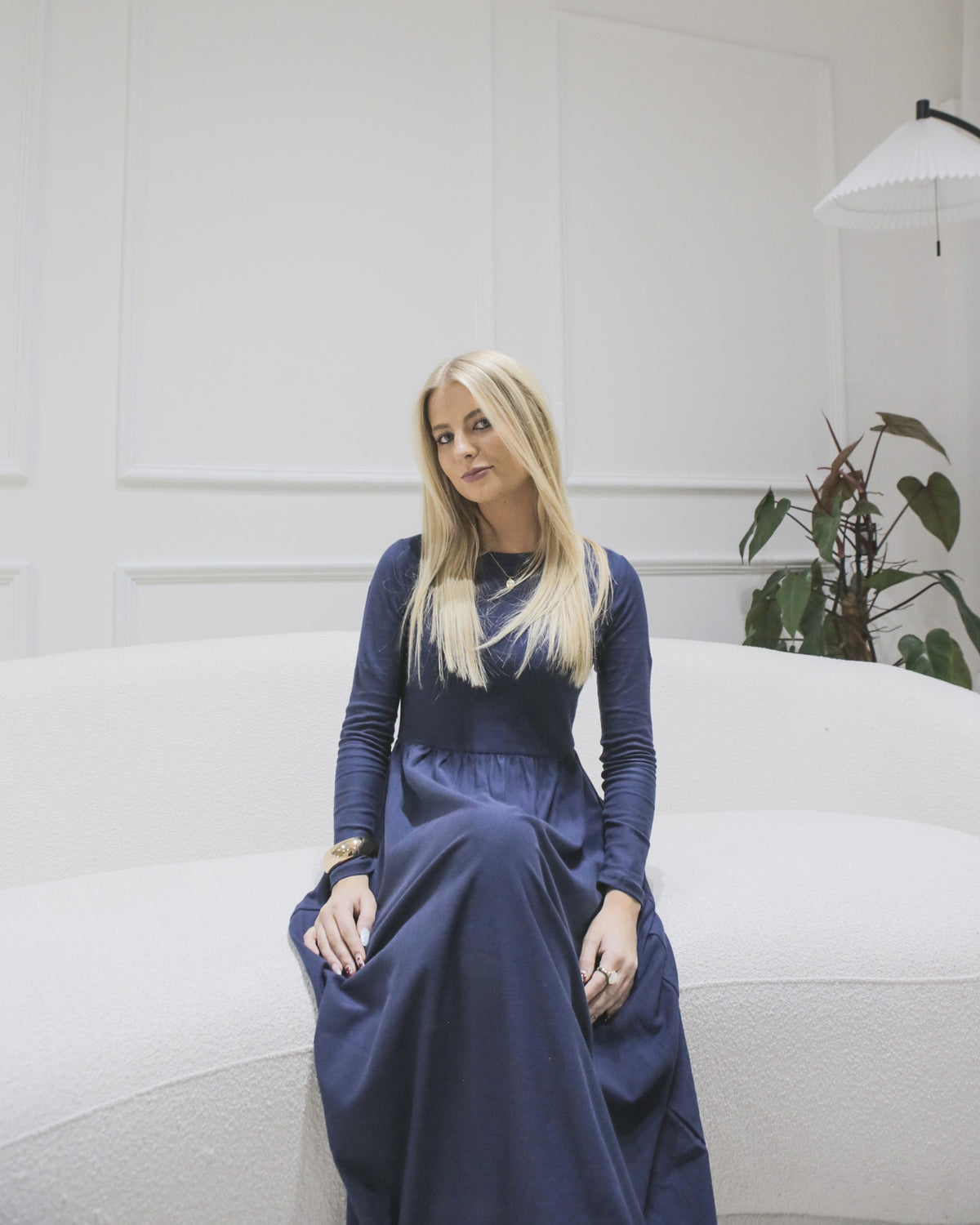 Navy seated view - Amina petite jersey maxi dress